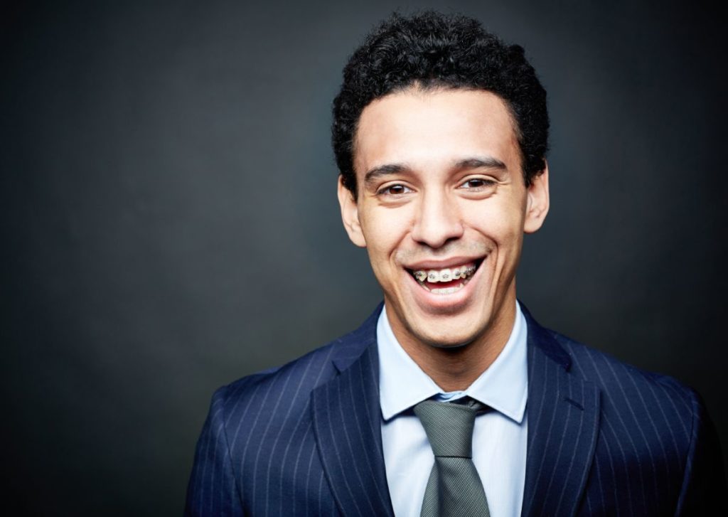Why you're more likely to get hired with a straight smile.